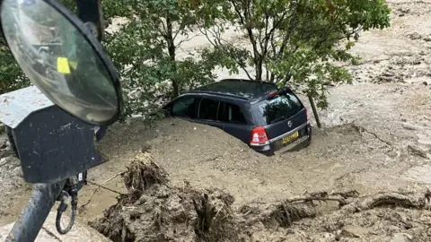 A & L McCrae LTD Car in landslide