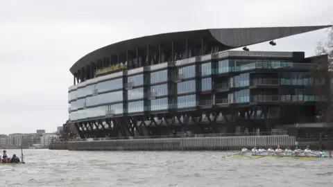 A view of Fulham's Riverside stand from the River Thames