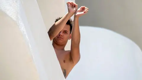 EPA A student reacts from a balcony at Palma Bellver in Palma de Mallorca, Balearic Islands, Spain, 28 June 2021
