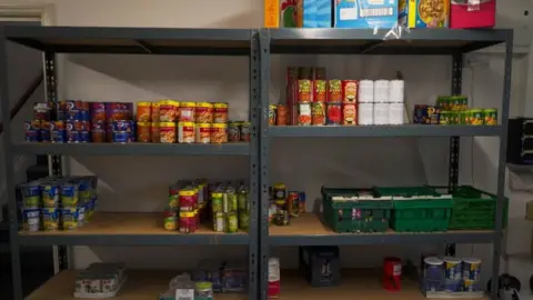 Jamie Moreland/BBC Food on shelves