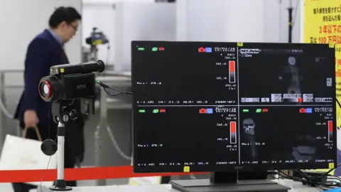 AFP Temperature scanning equipment at Narita airport