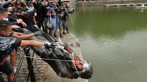 Colin Moody Colston statue lowered into Bristol harbour