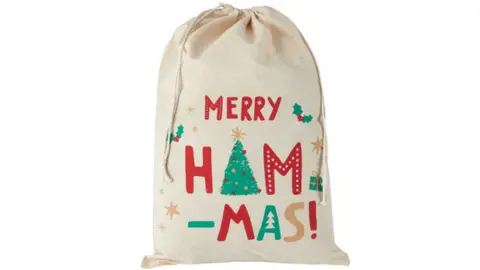 Kmart: Australian store pulls 'Merry Ham-mas' Christmas bag - BBC News