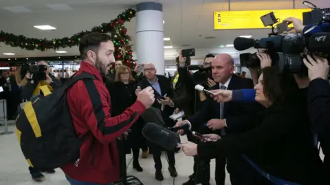 PA Billy Irving speaking to the media