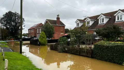 Natalie Bell / BBC Spilsby Road in Wainfleet flooded