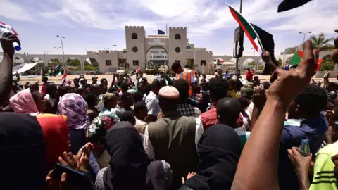 AFP Sudanese demonstrators attend a sit-in outside the defence ministry in Khartoum, Sudan April 14, 2019