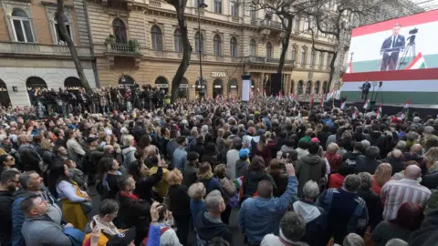 FERENC ISZA/AFP Peter Magyar delivers his speech during a demonstration in the centre of Budapest on March 15, 2024, on National Day that marks the Hungarian revolution against the Austrian Empire in 1848