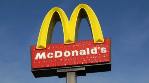 A sign for the fast food outlet McDonalds