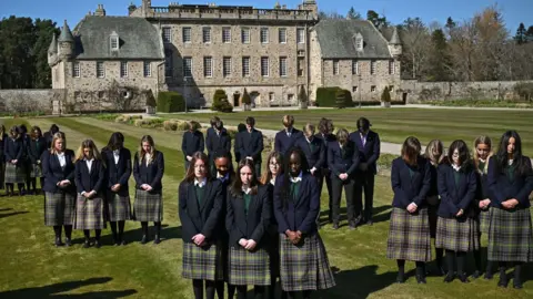 Jeff J Mitchell Pupils gather at Gordonstoun to observe the minute's silence for Prince Philip