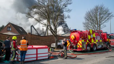 Nottinghamshire Fire and Rescue Service Fire crews at scrapyard fire