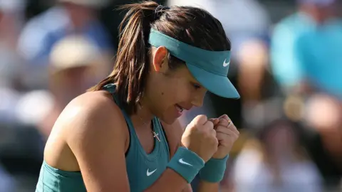 Emma Raducanu celebrates her win against Beatriz Haddad Maia