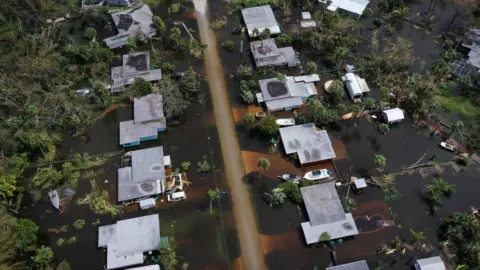 Getty Images An aerial shot of a neighbourhood flooded after Hurricane Ian moved through.