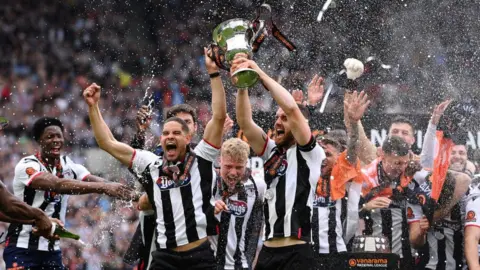 Getty Images Lifting the trophy