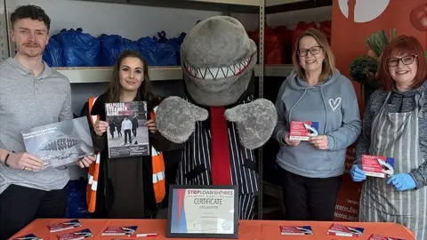 Illegal Money Lending Team Left to right: Zac Roberts and Hayley Medcalf, of Blackpool Food Bank, Julie Blair, of the Big Food Truck and Sharon Welsh-Smyth, Blackpool Food Bank volunteer