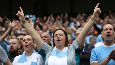 Reuters Football fans