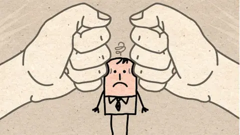 Getty Images Cartoon picture showing person with a migraine