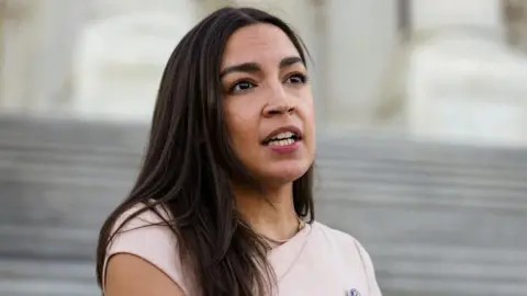 U.S. Representative Alexandria Ocasio-Cortez (D-NY) speaks to reporters.