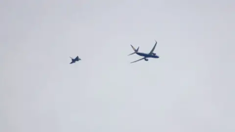 Andy Longhurst The plane being diverted