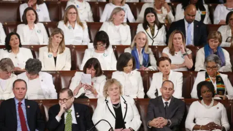 Mario Tama/Getty Images Democratic members of Congress listen to the State of the Union address