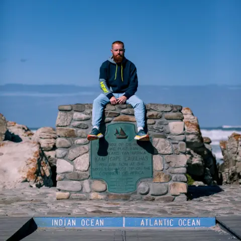 Jarred Karp Russell Cook at South Africa's most southerly point