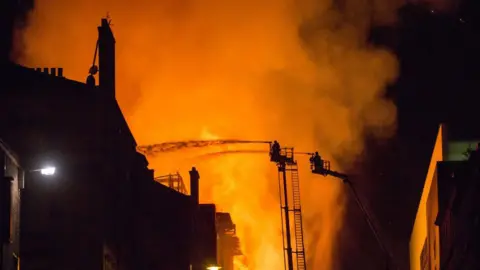Getty Images The School of Art building in Glasgow on fire in 2018