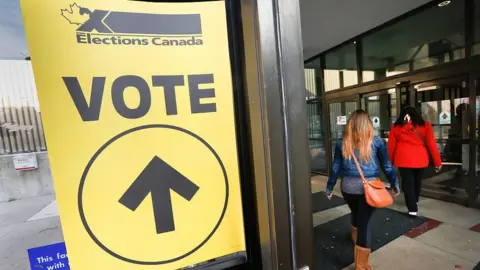 Bernard Weil/Getty Images Federal election day in Canada, 2015