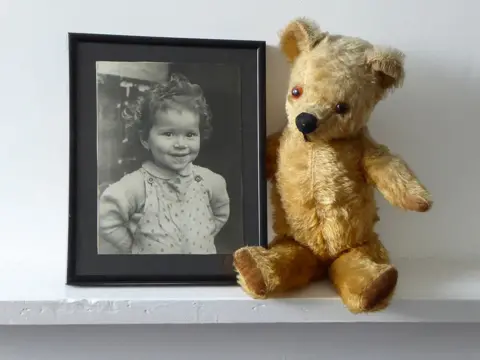 Verna Evans Teddy and a photograph