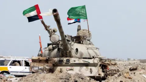 EPA UAE and Saudi flags on a tank as UAE troops take part in operations against Houthi rebels in the southern port city of Yemen, 8 August 2015