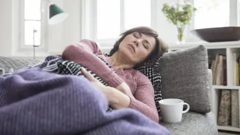 Getty Images Woman with fatigue