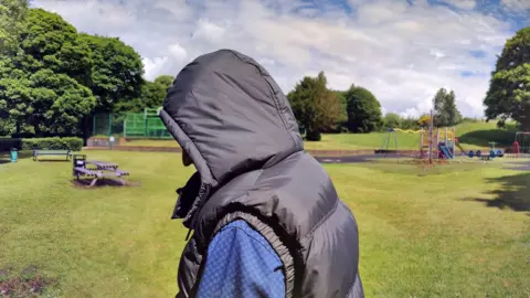 BBC Ahmed in a park