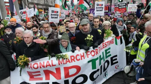 Jeff Moore/PA Protesters including Jeremy Corbyn and John McDonnell march in London