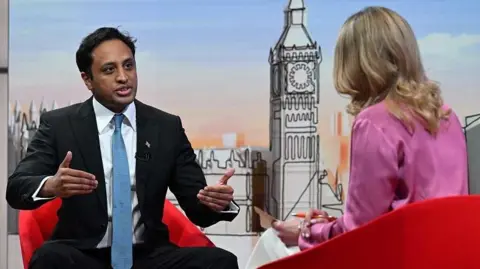 Reform UK chairman Zia Yusuf talks to Laura Kuenssberg on set of her show