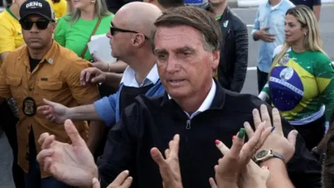 Reuters President Jair Bolsonaro greeted by supporters in Rio de Janeiro, 7 September 2022