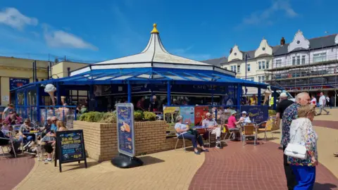 A large café on Barry sea front with large windows and a domed roof.