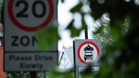 EPA-EFE/REX/Shutterstock A 20mph zone