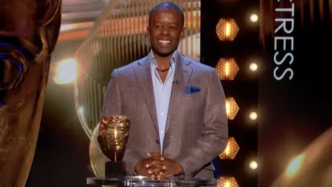 Adrian Lester