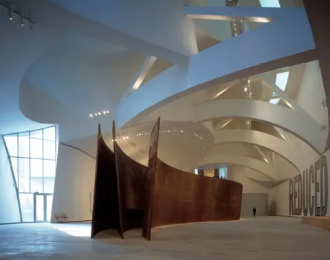 View Pictures/Universal Images Group via Getty Images An internal view of Bilbao's Guggenheim shows off the building's unique curved form. Light floods in from a glass wall to the left-hand side