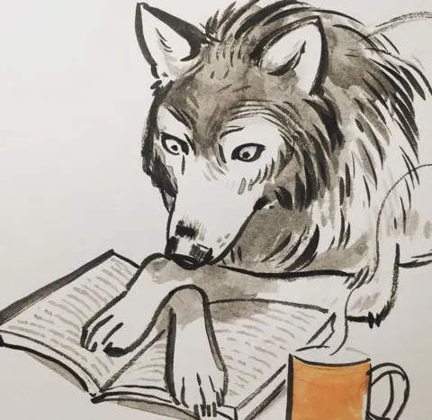 Anne Barnetson/CustomerServiceWolf.com Wolf reading a book