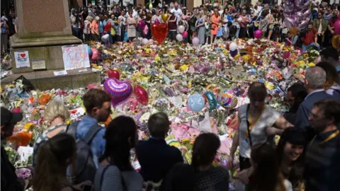 Getty Images Flowers at St Anne's Square