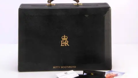 Special Auction Services A black leather House of Commons dispatch box with gilt tooling bearing cypher for Elizabeth II and Betty Boothroyd