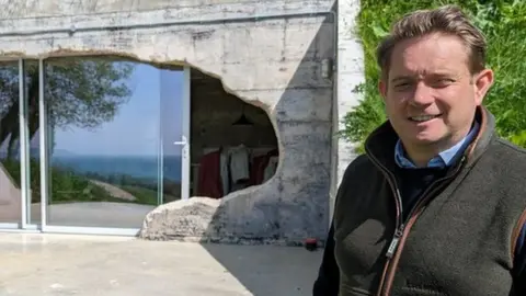 Architect Jonny Plant outside the converted bunker