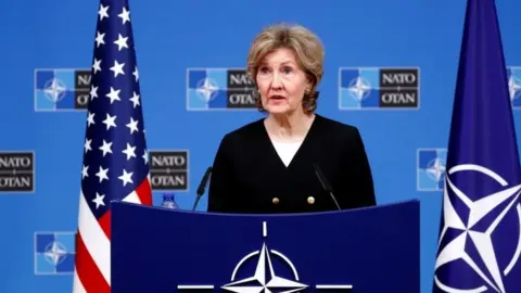 Reuters US ambassador to Nato Kay Bailey Hutchison briefs the media ahead of a Nato defence ministers in Brussels. Photo: 2 October 2018