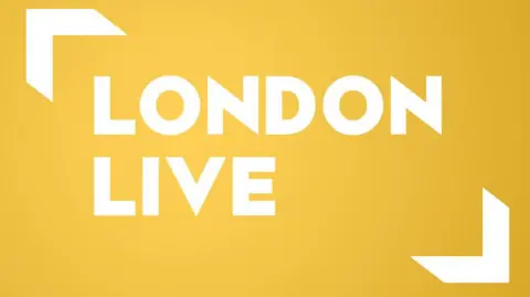 The logo of the station in white on a yellow background. 