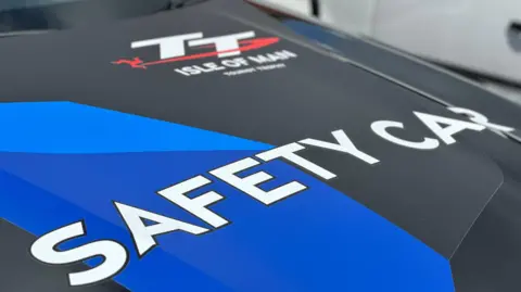 BBC The bonnet of the TT safety car, which is shades of blue and has the TT logo on it.