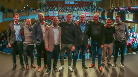 Southend United FC The consortium on stage at a fans' event