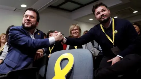 EPA Pere Aragonès, Catalonia's vice president, and MP of Catalan pro-independence party Esquerra Republicana (ERC) Gabriel Rufian shake hands during a meeting held in Barcelona, Catalonia