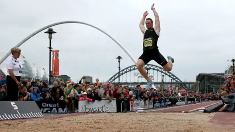 PA Greg Rutherford competing in the long jump event