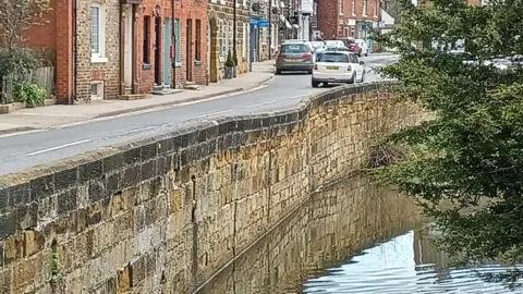 Great Ayton's High Street and River Leven