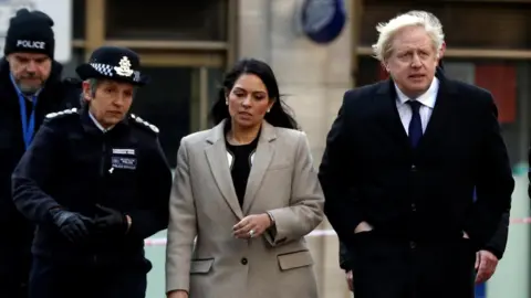 Getty Images Cressida Dick, Priti Patel and Boris Johnson