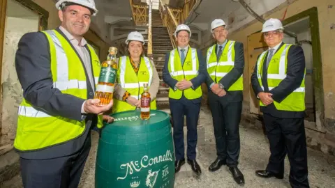 Department for the Economy John Kelly, Deirdre Hargey; Gordon Lyons; John O'Dowd;and Mel Chittock from Invest NI at the gaol